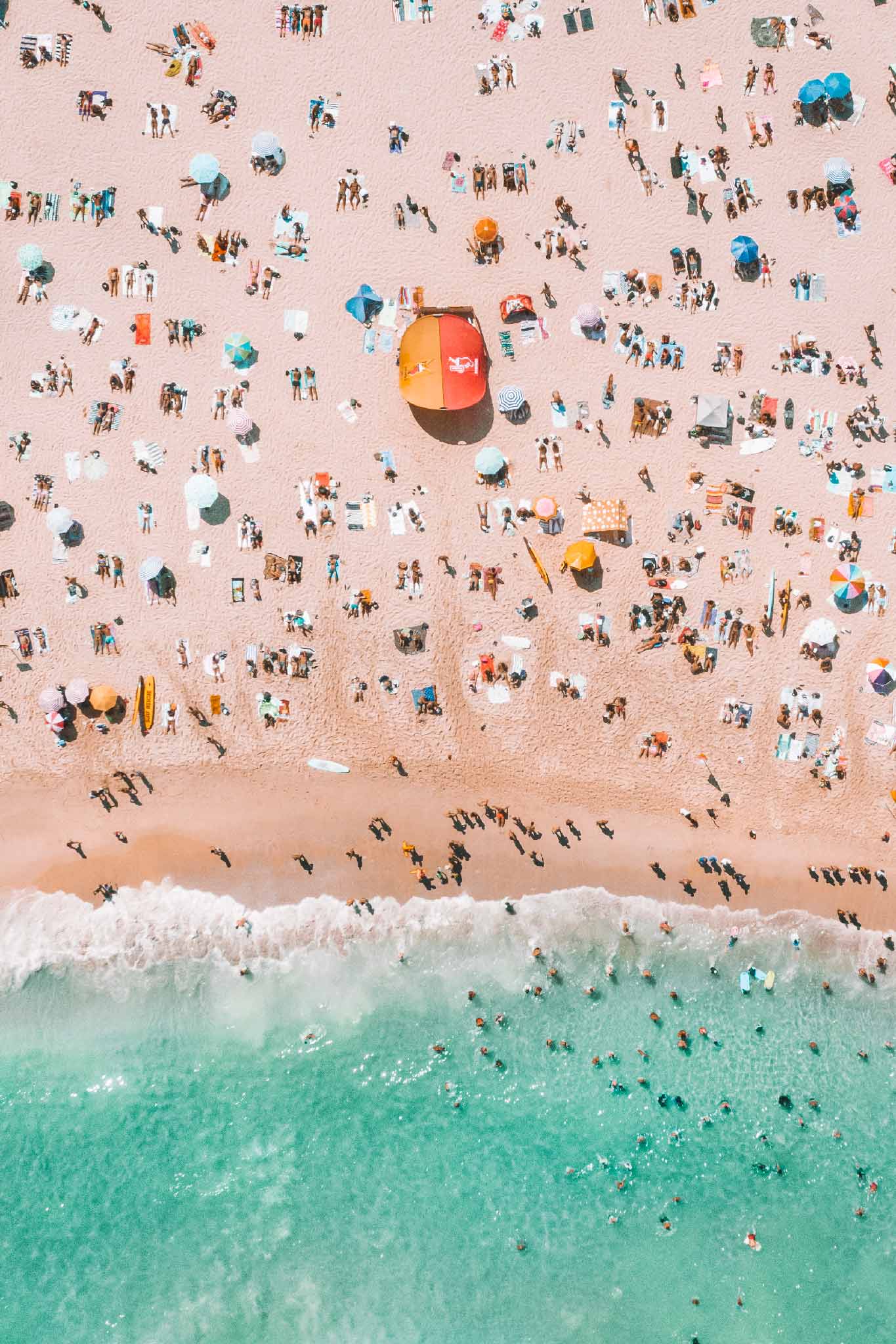 Tamarama Cram by Will Salkeld, aerial of Tamarama Beach in summer with turquoise water and packed sand, colour photography.